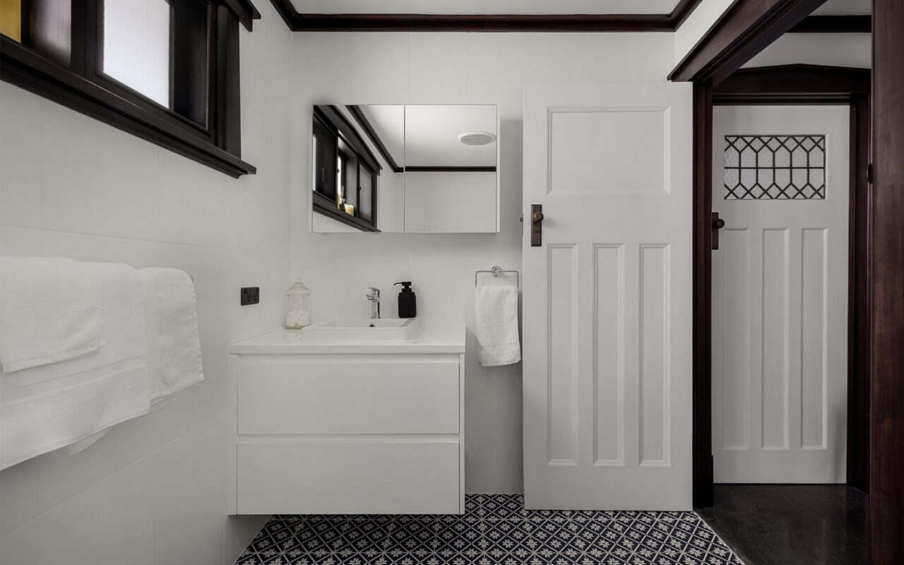 Elegant renovated bathroom with heritage detailing and modern finishes at luxury Barossa accommodation