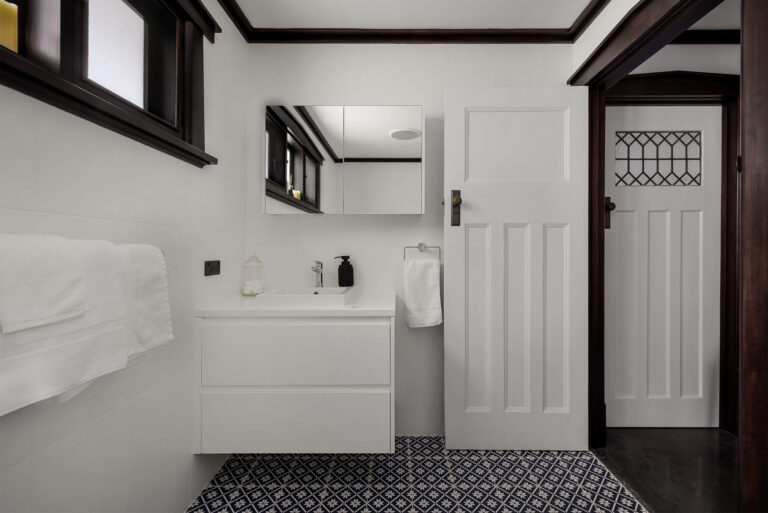 Elegant renovated bathroom with heritage detailing and modern finishes at luxury Barossa accommodation