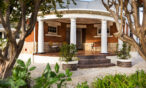 Traditional wraparound veranda entrance surrounded by gardens at heritage Barossa Valley accommodation